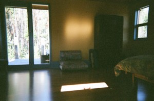 Master bedroom with windows in every direction and a deck!