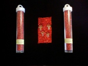 Sparkly red beads at threshold